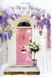 A lovingly composed doorway scene in Woodford captures the emotion of turning a new key and stepping into a fresh chapter of life. The door itself is painted in a gentle, powdery pink, its surface smooth and reassuringly solid, framed by crisp white masonry that reflects the soft daylight. Overhead, a flourishing canopy of wisteria tumbles downward, each stem heavy with clusters of tiny lavender and lilac flowers. The way the wisteria drapes around the upper frame of the door feels almost like a floral curtain being drawn back, revealing the possibilities waiting just inside. To one side of the threshold rests a simple yet elegant metal bucket, weathered to a soft grey and brimming with freshly opened white and cream roses. Their petals appear thick and velvety, layered in generous spirals that glow subtly against the contrast of lush green foliage. Encircling the base of the bucket, a narrow pink ribbon is tied into a graceful bow, its colour echoing the door and adding a refined, celebratory touch that suggests the deft hand of a skilled florist. The light in the scene has a warm, late-afternoon quality, the sort you might notice while walking home from Ray Lodge Park, casting delicate shadows from the wisteria onto the wall and step. Nothing is showy, yet every detail-the pastel palette, the natural curves of the trailing blooms, the thoughtful placement of the arrangement-contributes to a profound sense of welcome. The image feels ideal for marking a house move or new start in Woodford, radiating gentle optimism, comfort, and the quiet promise that this doorway will soon become a cherished home.